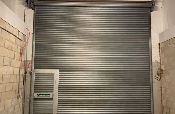 steel roller shutter with wicket door